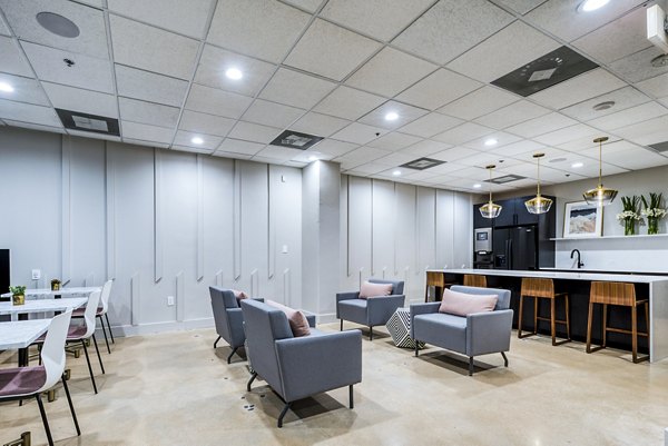 Modern clubhouse/lobby with sleek design at Inspire Downtown Apartments, offering luxury and comfort for urban living