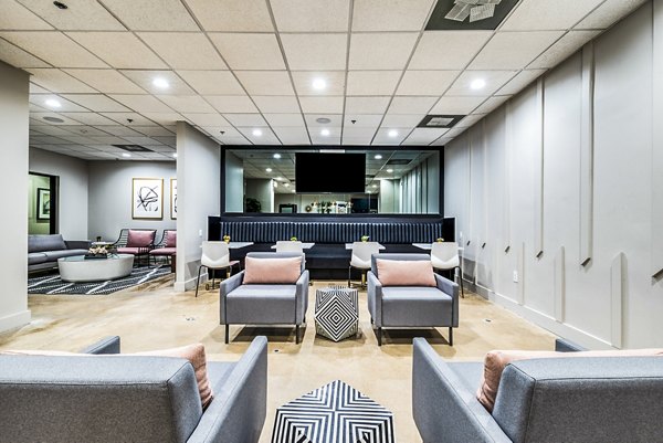 Clubhouse lobby featuring modern seating and decor at Inspire Downtown Apartments