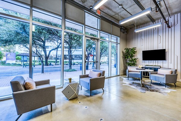 Clubhouse lobby featuring modern design and luxurious seating at Inspire Downtown Apartments luxury apartments