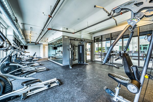 Fitness center with modern equipment at Inspire Downtown Apartments, ideal for active lifestyles in a luxury urban setting