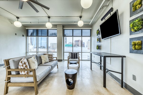 Spacious living room with modern decor at Inspire Downtown Apartments