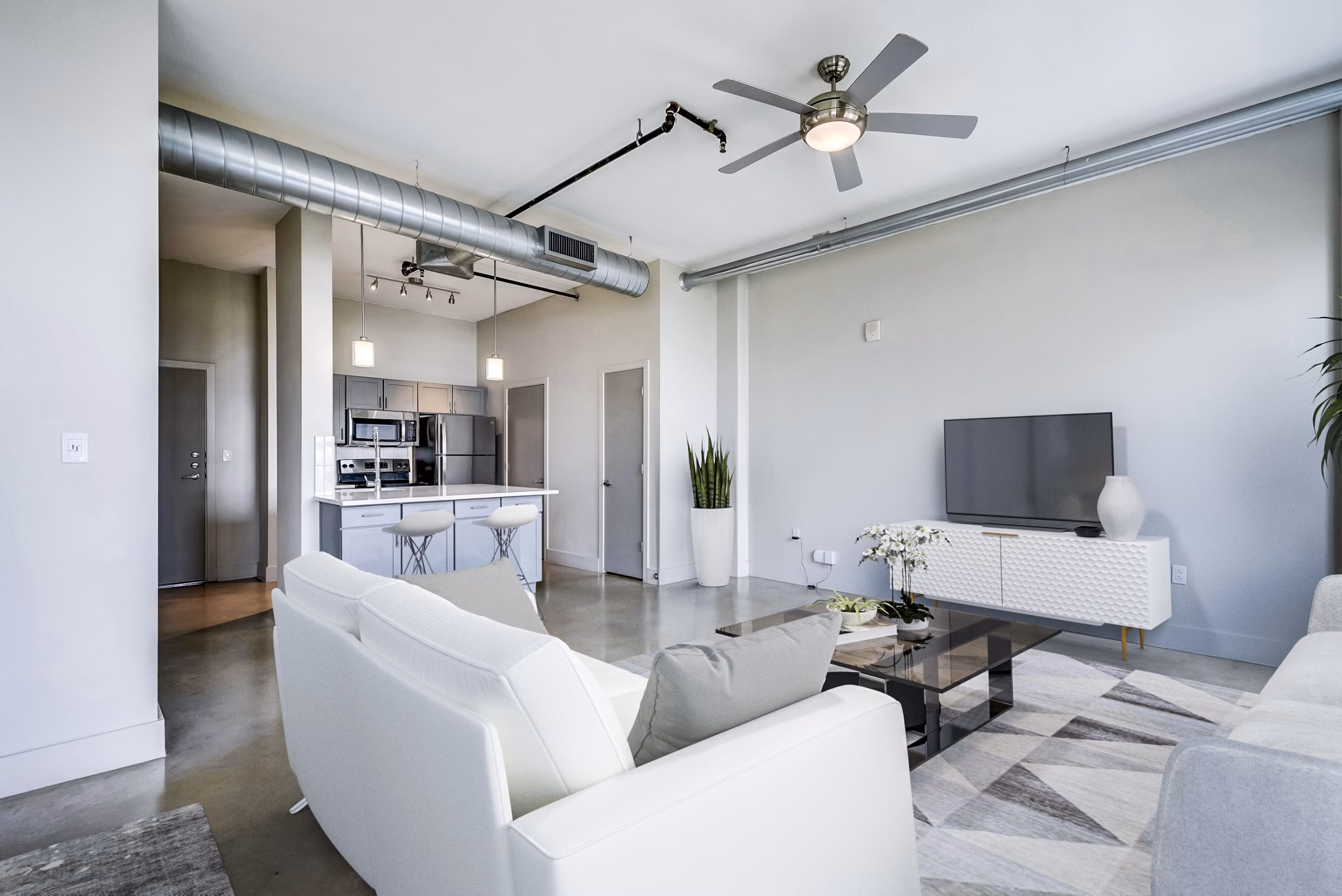Inspire Downtown Apartments: Modern high-rise featuring sleek design and city views in a vibrant urban setting