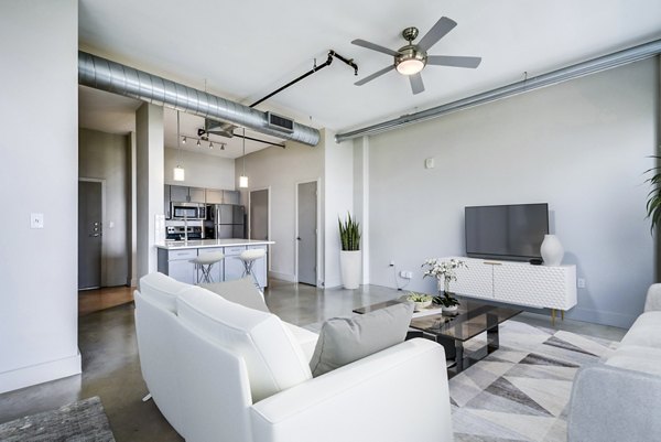 Inspire Downtown Apartments: Modern high-rise featuring sleek design and city views in a vibrant urban setting