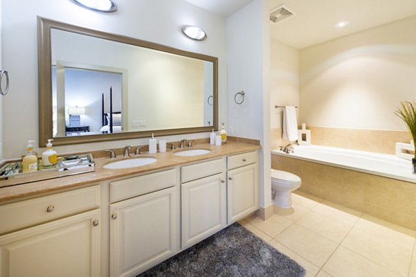 Luxurious bathroom with modern fixtures at The Museum Tower Apartments