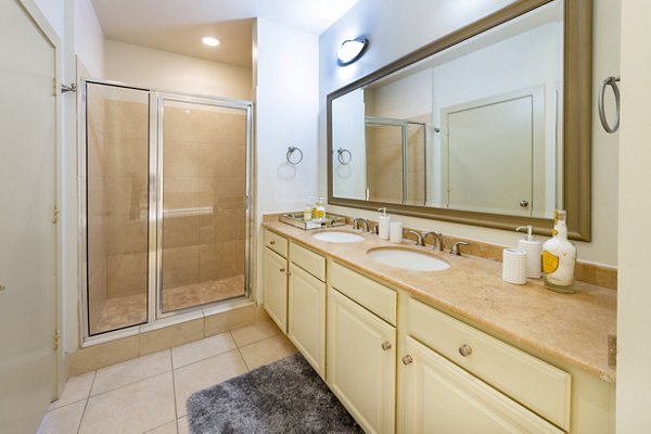 Bathroom with sleek fixtures and modern lighting in The Museum Tower Apartments