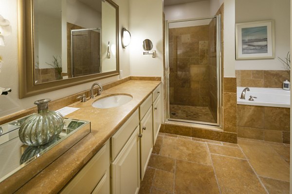 Modern bathroom featuring sleek fixtures at The Museum Tower Apartments