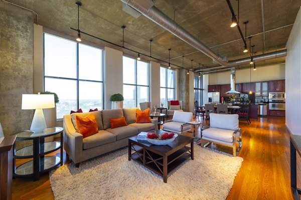 Spacious living room with contemporary design elements at The Museum Tower Apartments