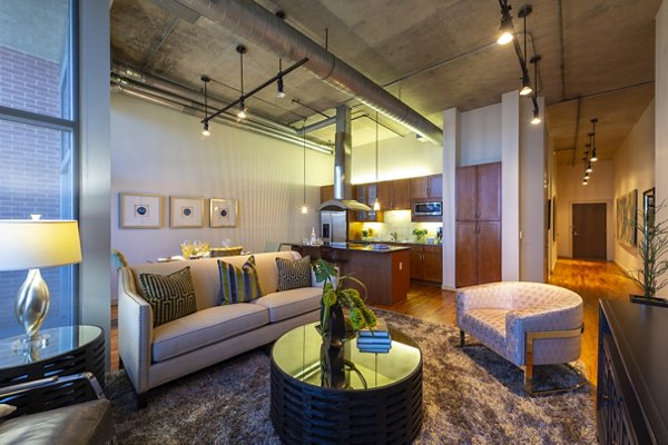 Spacious living room with contemporary decor in The Museum Tower Apartments