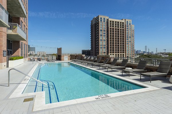 Rooftop pool with city views at The Museum Tower Apartments