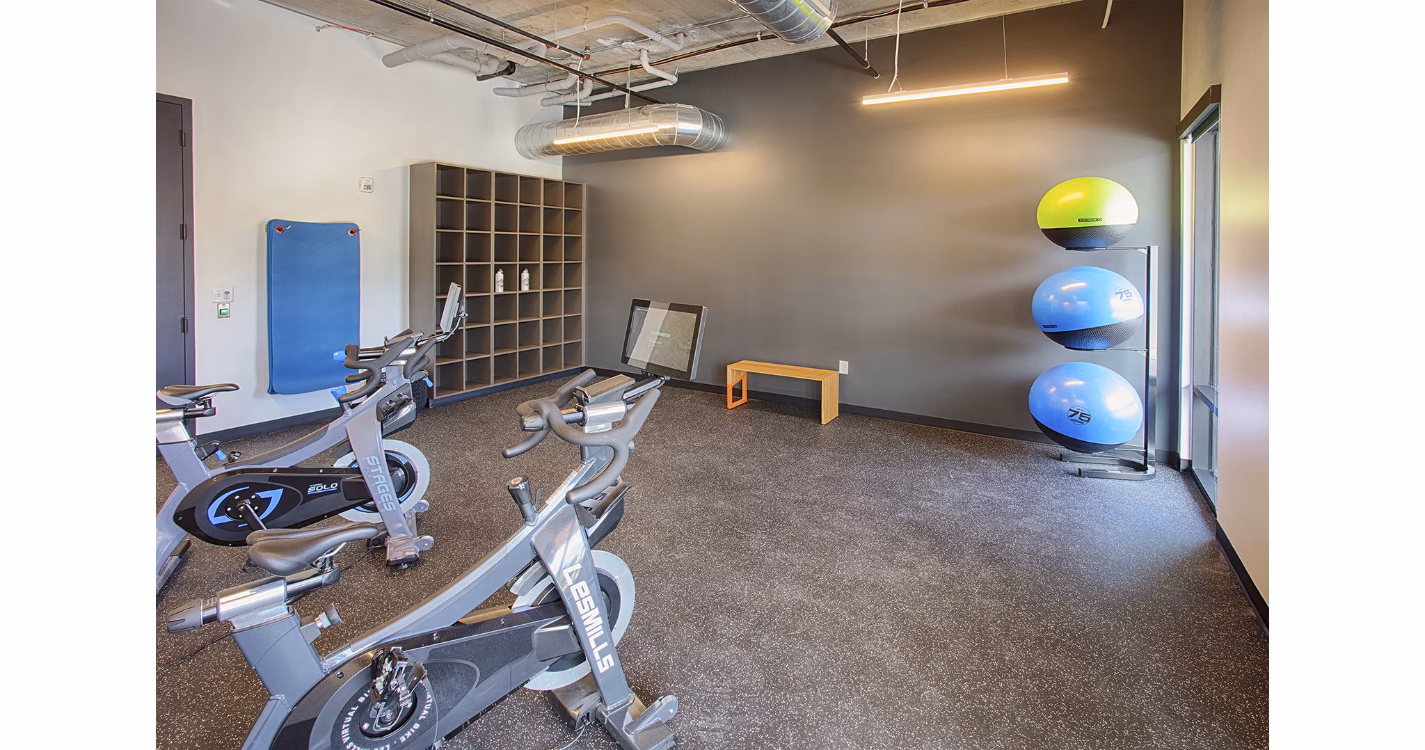State-of-the-art fitness center with modern equipment at South Main Station Apartments