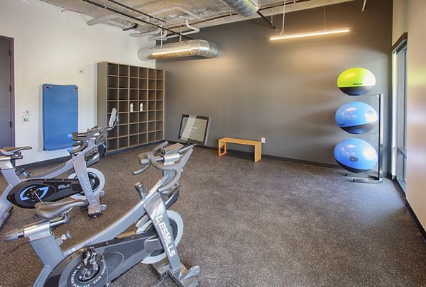 State-of-the-art fitness center with modern equipment at South Main Station Apartments