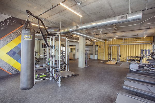 Fitness center with modern equipment at South Main Station Apartments