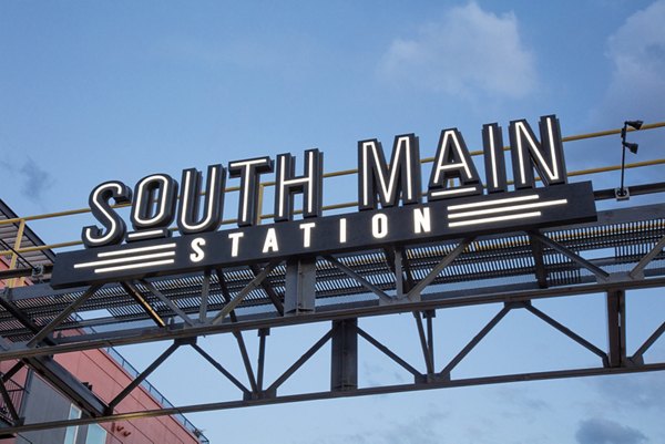Vibrant neighborhood near South Main Station Apartments featuring shops and dining options in central location