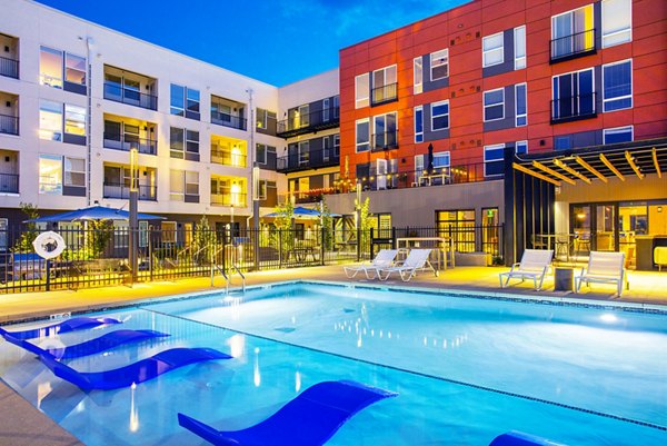 Sparkling outdoor pool at South Main Station Apartments