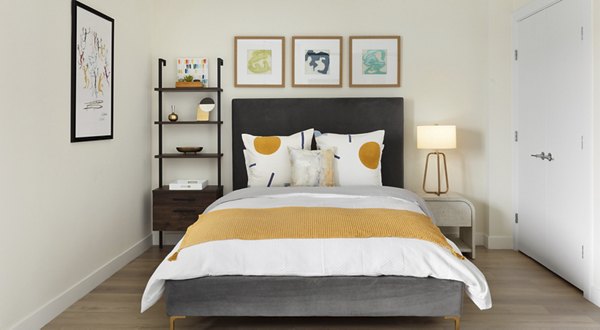Spacious bedroom with elegant decor at Hamilton Cove Apartments, a luxury community