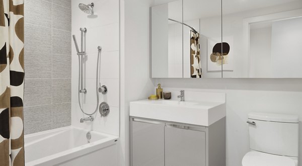 Modern bathroom with elegant fixtures at Hamilton Cove Apartments