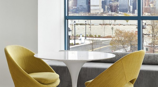Clubhouse view at Hamilton Cove Apartments: modern design and inviting entrance showcasing luxury living