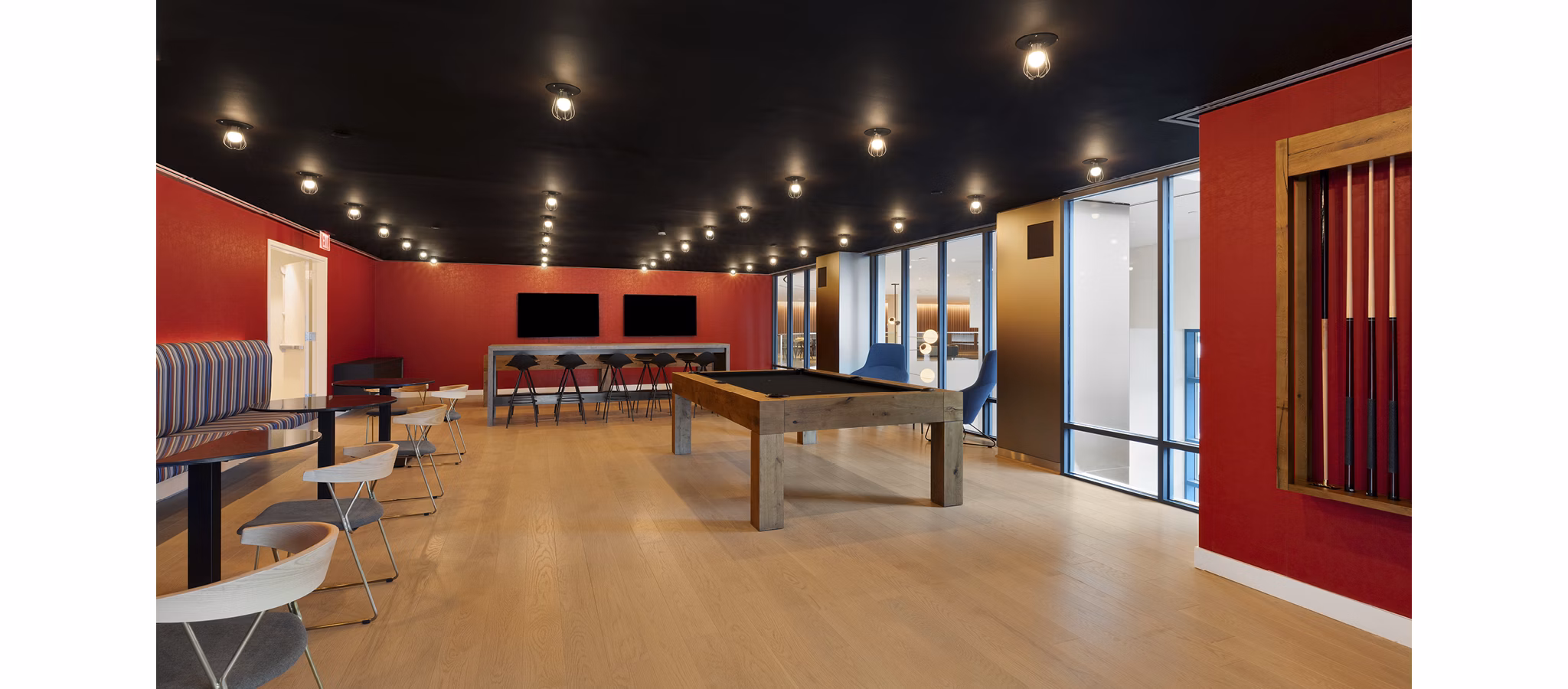 Hamilton Cove Apartments: Modern game room with billiards and lounge area