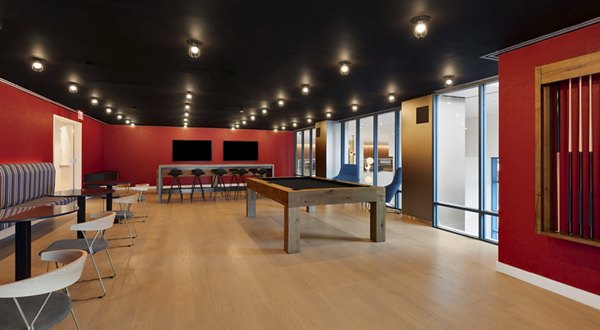 Hamilton Cove Apartments: Modern game room with billiards and lounge area