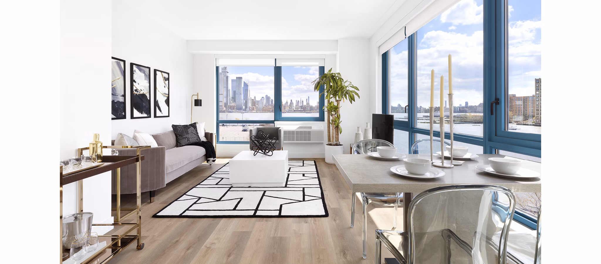 Dining area featuring modern design and stylish furnishings at Hamilton Cove Apartments in Greystar community