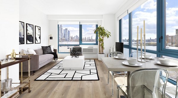 Dining area featuring modern design and stylish furnishings at Hamilton Cove Apartments in Greystar community