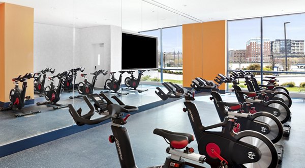 Modern fitness center with top-tier equipment at Hamilton Cove Apartments in luxury Greystar community