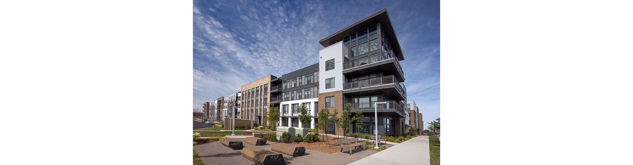 The Penrose Apartments: Elegant view of luxury apartments in vibrant urban setting