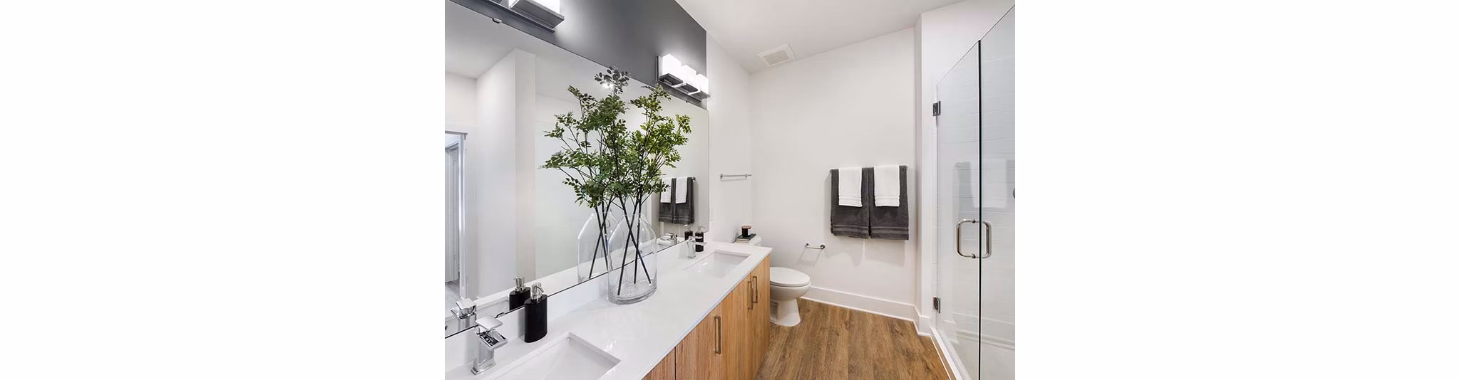 Elegant bathroom with sleek fixtures at The Penrose Apartments