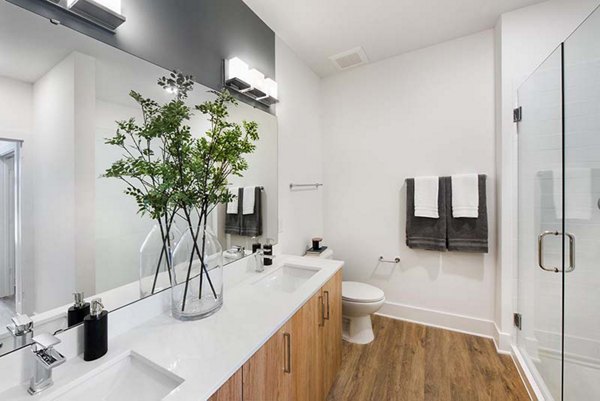 Elegant bathroom with sleek fixtures at The Penrose Apartments