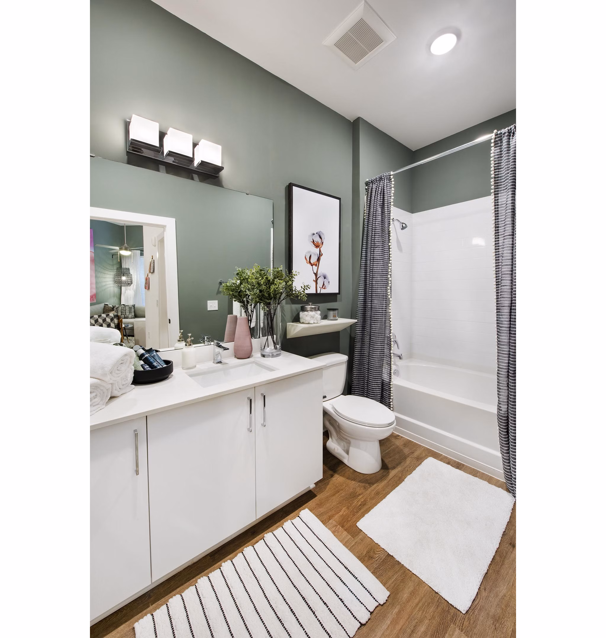 Modern bathroom with sleek fixtures at The Penrose Apartments providing luxury living amenities