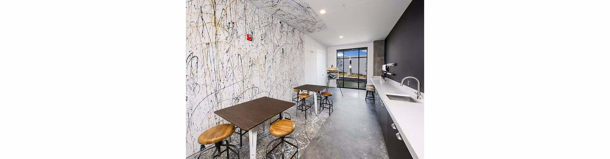 Clubhouse featuring modern design and upscale amenities at The Penrose Apartments, Greystar luxury living