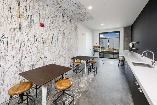 Clubhouse featuring modern design and upscale amenities at The Penrose Apartments, Greystar luxury living