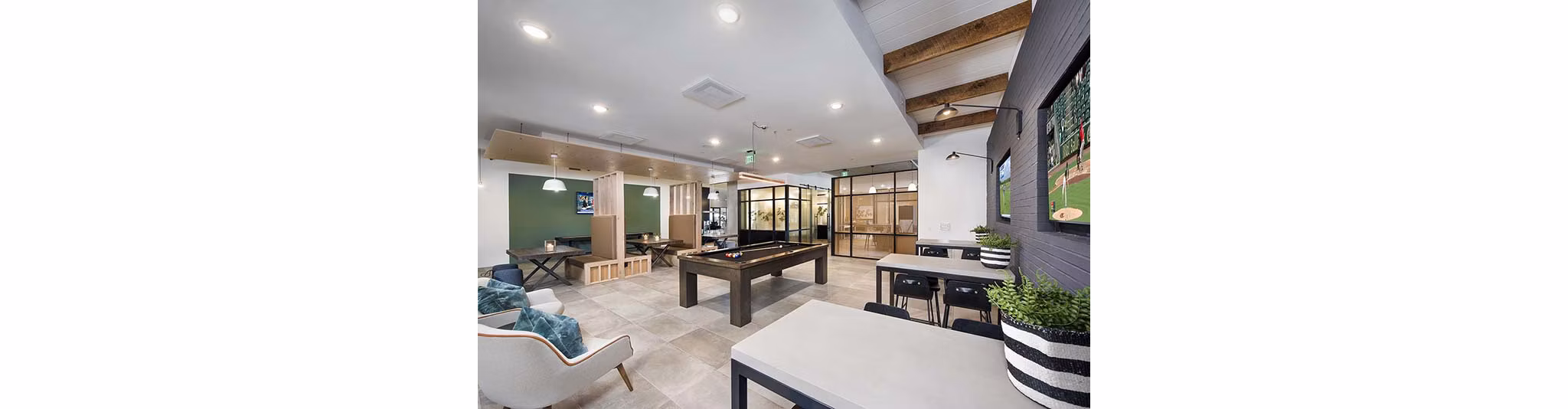 Clubhouse with modern furnishings at The Penrose Apartments offering luxury living experience