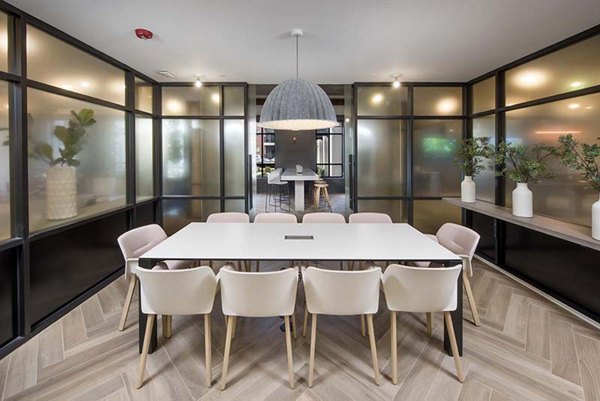 Meeting facility with modern equipment at The Penrose Apartments, ideal for business gatherings and events