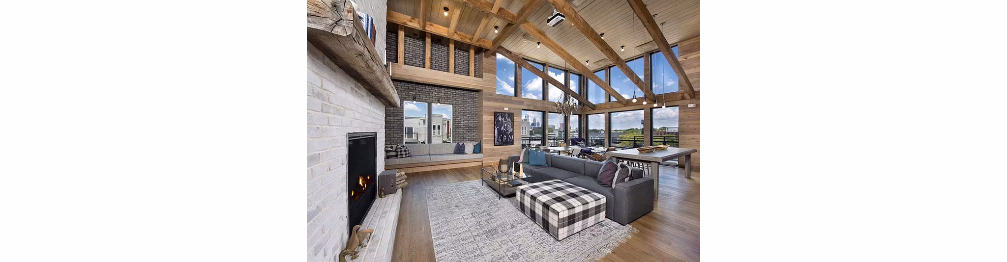 Modern clubhouse with vibrant interiors at The Penrose Apartments, offering luxury amenities and social spaces for residents