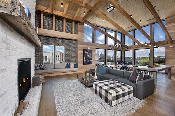 Modern clubhouse with vibrant interiors at The Penrose Apartments, offering luxury amenities and social spaces for residents