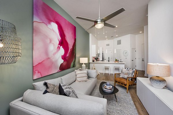 Modern living room with stylish decor at The Penrose Apartments in the Greystar luxury apartments collection