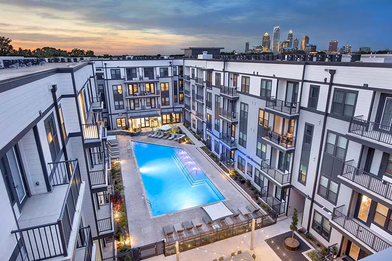 Rooftop pool with stunning city views at The Penrose Apartments, a Greystar property