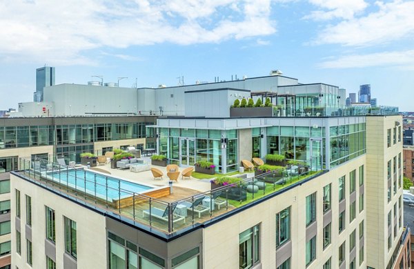 Resort-style pool at The Smith Apartments offering leisure and relaxation in a luxury setting