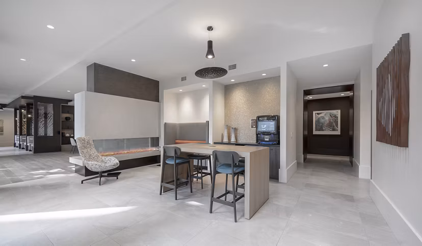 Spacious clubhouse with modern decor at The Smith Apartments, a luxury property offering prime communal spaces for residents