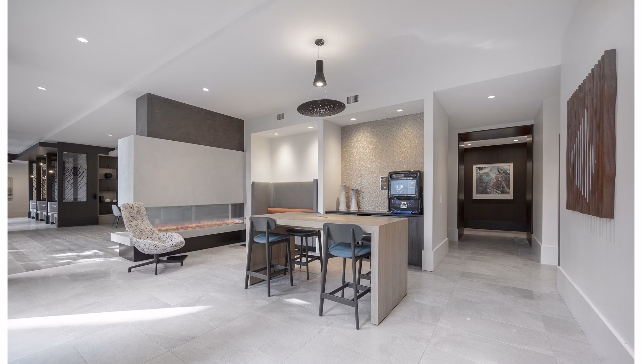 Spacious clubhouse with modern decor at The Smith Apartments, a luxury property offering prime communal spaces for residents