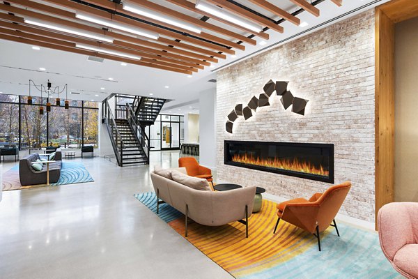 Elegant clubhouse with modern furnishings at The Smith Apartments, offering residents a luxurious community space