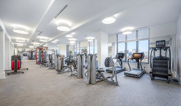 State-of-the-art fitness center with modern equipment at The Smith Apartments