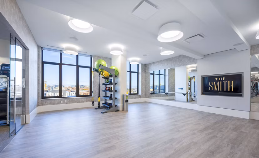 Yoga studio featuring state-of-the-art equipment at The Smith Apartments, ideal for wellness enthusiasts and residents seeking a balanced lifestyle