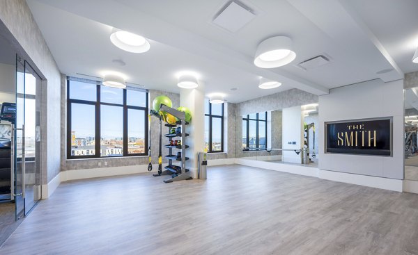 Yoga studio featuring state-of-the-art equipment at The Smith Apartments, ideal for wellness enthusiasts and residents seeking a balanced lifestyle