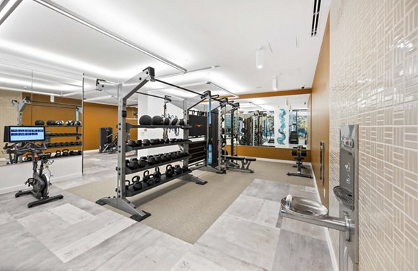 State-of-the-art fitness center with modern equipment at The Smith Apartments