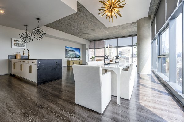 Dining room featuring elegant decor and modern furnishings at Imprint Apartments