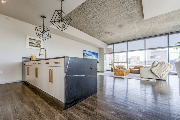 Modern kitchen featuring stainless steel appliances at Imprint Apartments
