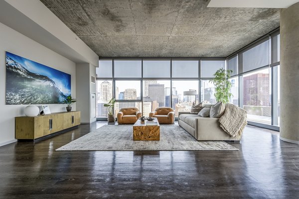 Spacious living room with contemporary decor at Imprint Apartments