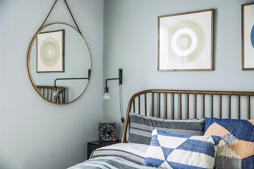 Stylish bedroom with elegant decor at The Griffith Apartments in downtown Bellevue